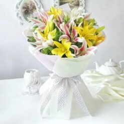 Graceful Lily Medley featuring fresh, fragrant lilies arranged beautifully, ideal for gifting on birthdays, anniversaries, or special celebrations.