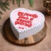 Hugs & Kisses Heart Cake – A charming, heart-shaped cake filled with rich flavors, perfect for celebrating love and special moments.