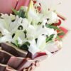 Opulent Lily Radiance bouquet – a luxurious arrangement of fresh lilies, perfect for celebrations, romantic gestures, and special moments.