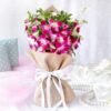 Orchid Elegance Bouquet featuring fresh, vibrant orchids beautifully arranged to add sophistication and charm to any celebration or decor.