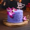 Orchids Purple Haze Cake – A beautifully designed cake featuring vibrant purple hues and delicate orchid details, perfect for special occasions.