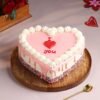 Pink Blossom Heart Cake – A beautifully designed heart-shaped cake adorned with pink floral accents, perfect for romantic celebrations and special occasions.