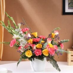 Radiant Floral Retreat – A stunning arrangement of colorful flowers, designed to bring vibrancy and charm to your special moments.