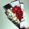 Beautiful Red N White Passion Roses bouquet featuring a striking mix of red and white roses, symbolizing love, unity, and purity.