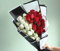 Beautiful Red N White Passion Roses bouquet featuring a striking mix of red and white roses, symbolizing love, unity, and purity.