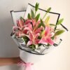 Regal Lily Bliss – A luxurious bouquet of fresh lilies, exuding elegance, purity, and sophistication for all occasions.