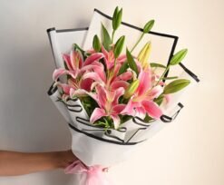 Regal Lily Bliss – A luxurious bouquet of fresh lilies, exuding elegance, purity, and sophistication for all occasions.