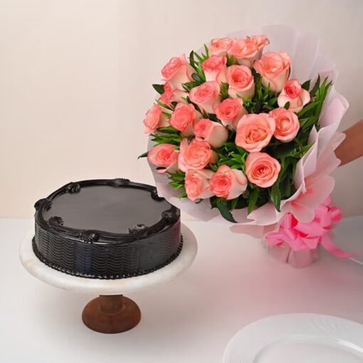 Elegant bouquet of roses paired with a decadent cake, perfect for romantic surprises, anniversaries, and special celebrations.