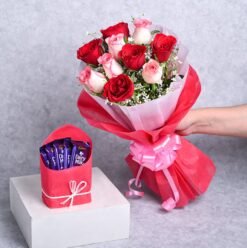 Rosy Choco Surprise – A charming gift set featuring beautiful roses and delicious chocolates, ideal for heartfelt occasions and sweet surprises.