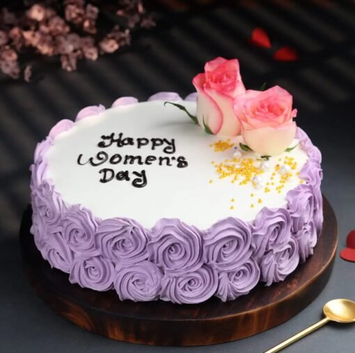 Rosy Glow Women’s Day Cake with pink hues and floral decorations, perfect for celebrating the strength and beauty of women.