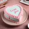 Rosy Heart Valentine's Day Cake – A stunning heart-shaped cake adorned with elegant roses, perfect for celebrating love and romance on Valentine's Day.