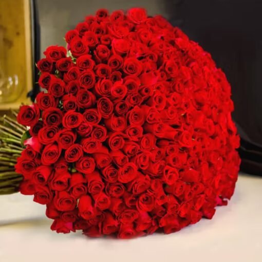 Scarlet Whispers Bouquet – A luxurious bouquet of deep red roses, perfect for romantic gestures, anniversaries, and special celebrations.