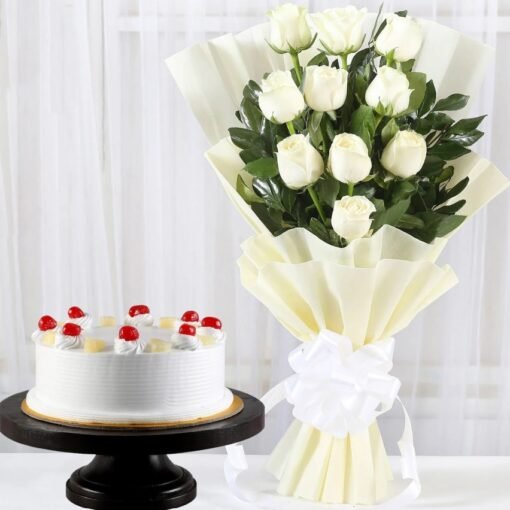 Elegant White Roses bouquet with a moist and flavorful pineapple cake, ideal for birthdays, anniversaries, and special occasions.