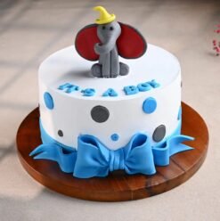 Charming Baby Elephant Cake with cute fondant details, ideal for baby showers, first birthdays, and elephant-themed celebrations.