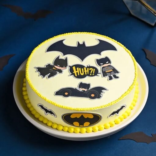 Batman Theme Cake with Gotham skyline, Batman logo, and edible decorations, perfect for superhero-themed birthdays and celebrations.