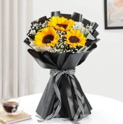 A vibrant bouquet of fresh sunflowers, radiating warmth and joy, perfect for gifting on special occasions or brightening any space.