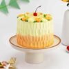 Blossom Pineapple Kiss Cake – a soft, fluffy pineapple-flavored cake adorned with delicate floral decorations and creamy frosting.