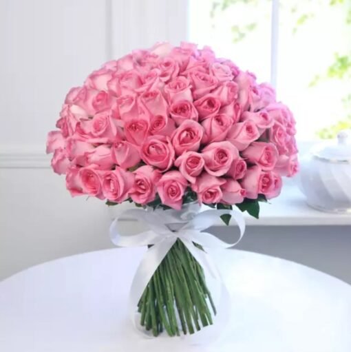 Blush of Romance Bouquet featuring delicate roses in soft hues, ideal for anniversaries, weddings, and romantic surprises.