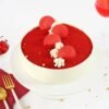 Crimson Velvet Cake – a deep red, velvety soft cake layered with luscious cream cheese frosting, perfect for special occasions.