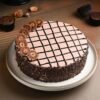 Dark Desire Ferrero Rocher Cake with rich chocolate layers, hazelnut crunch, and Ferrero Rocher toppings for a luxurious treat.