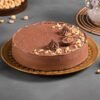 Decadent Ferrero Rocher Indulgence Cake with rich chocolate layers, hazelnut crunch, and Ferrero Rocher toppings for a luxurious dessert treat.