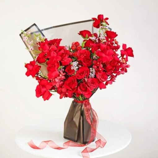 Forever Yours Floral Arrangement featuring a gorgeous mix of fresh flowers, ideal for romantic occasions like anniversaries, proposals, and weddings.