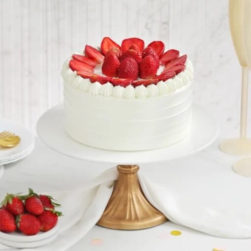 Frosted Strawberry Elegance Cake – a beautifully decorated cake with fresh strawberries, silky frosting, and a touch of sophistication.