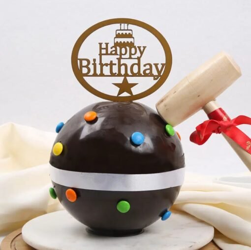 Fun-filled Gems Chocolate Pinata Cake with a chocolate shell, vibrant candy gems inside, and a hammer for an exciting surprise.