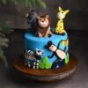 Colorful Happy Animals Jungle Cake with fondant animals, jungle trees, and edible greenery, ideal for kids' birthday parties and themed celebrations.