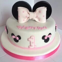 Little One’s Minnie Mouse Cake with cute Minnie-themed decorations, fondant bows, and a sweet pink design for a magical birthday celebration.
