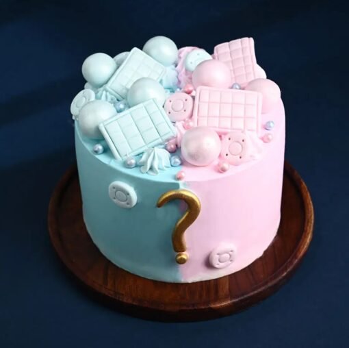 Magical Gender Reveal Cake with pink and blue decorations, ideal for baby showers and surprise gender reveal celebrations.