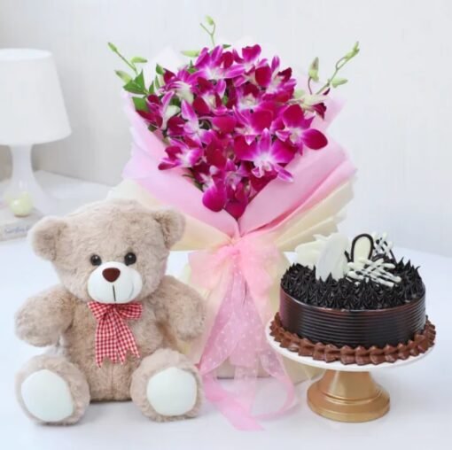 Orchids Teddy Cake Combo – a charming gift set with fresh orchids, a plush teddy bear, and a tasty cake.