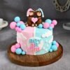 Pink & Blue Baby Bliss Cake with pastel frosting, adorable baby-themed decorations, and elegant details, perfect for baby showers and gender reveals.