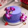 Purple Graceful Blossoms Cake – a beautifully decorated floral cake with shades of purple, perfect for celebrations and special moments.