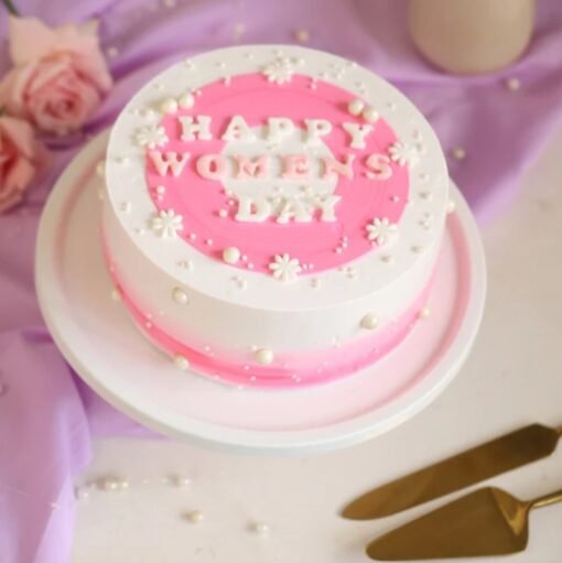 Rosy Elegance Women's Day Cake – a stunning pink-themed cake with delicate floral decor, symbolizing beauty, grace, and empowerment.