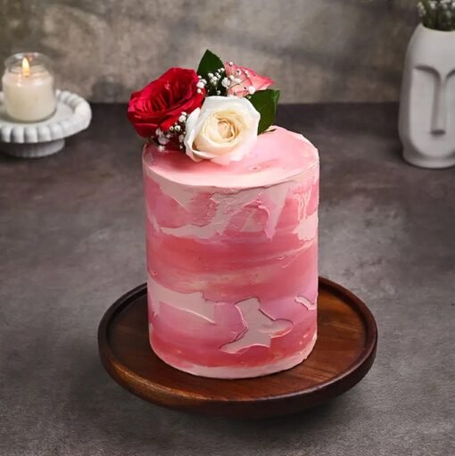 Rosy Glow Wedding Cake – a stunning floral wedding cake with delicate rose-themed decorations, perfect for elegant celebrations.