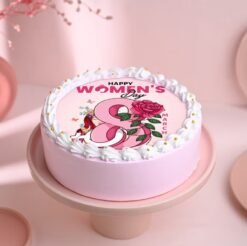 Rosy Glow Women's Day Cake – a delicate pink-themed cake representing beauty, warmth, and admiration, perfect for honoring women.