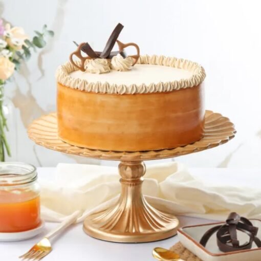 Decadent Salted Caramel Cake layered with moist sponge, rich caramel drizzle, and a hint of sea salt for the perfect flavor contrast.