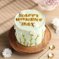 She Blooms Celebration Cake – a beautifully decorated floral cake symbolizing growth, beauty, and empowerment for birthdays and Women's Day.