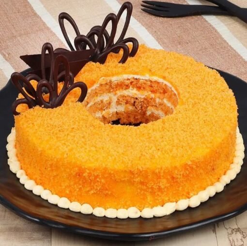 Zesty Orange Donut Cake with a citrus glaze, soft texture, and vibrant orange zest topping for a refreshing treat.