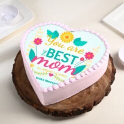 Best Mother’s Day Heart Cake — a beautifully crafted heart-shaped cake with floral accents and "Best Mom" message for Mother’s Day.