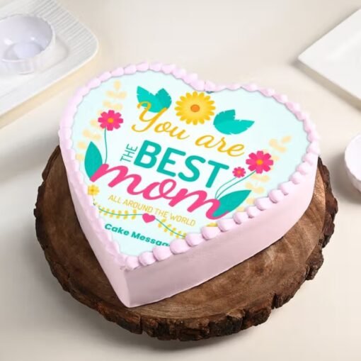 Best Mother’s Day Heart Cake — a beautifully crafted heart-shaped cake with floral accents and "Best Mom" message for Mother’s Day.
