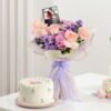 Charming Blooms And Cake For Her — vibrant floral arrangement paired with a delectable cake, designed for heartfelt celebrations and special occasions.