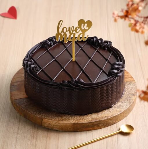 Chocolate Truffle Mother’s Day Cake — rich, glossy chocolate cake with elegant decorations and a heartfelt Mother’s Day message.