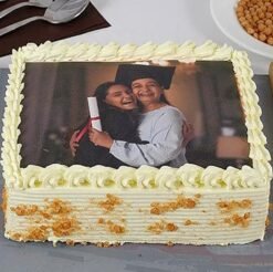 Love You Mom Butterscotch Cake — golden brown cake with decorative text and elegant toppings, perfect for Mother’s Day.