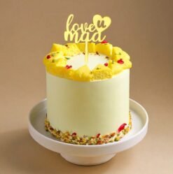 Love You Mom Rasmalai Cake — fusion dessert with rasmalai topping, creamy layers, and “Love You Mom” message for Mother’s Day.