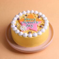 Maa’s Golden Magic Cake — elegant cake with gold accents, floral décor, and a “Maa” topper, perfect for a regal Mother’s Day celebration.