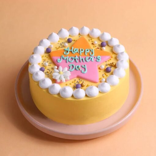 Maa’s Golden Magic Cake — elegant cake with gold accents, floral décor, and a “Maa” topper, perfect for a regal Mother’s Day celebration.