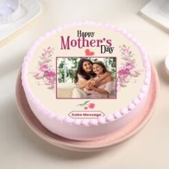 Mother’s Day Photo Cake — beautifully frosted cake with a custom edible photo and decorative floral accents for Mother’s Day celebration.