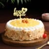 Nutty Tropical Mother’s Day Cake — tropical fruit-topped cake with nutty layers, decorated for a refreshing and delightful celebration.